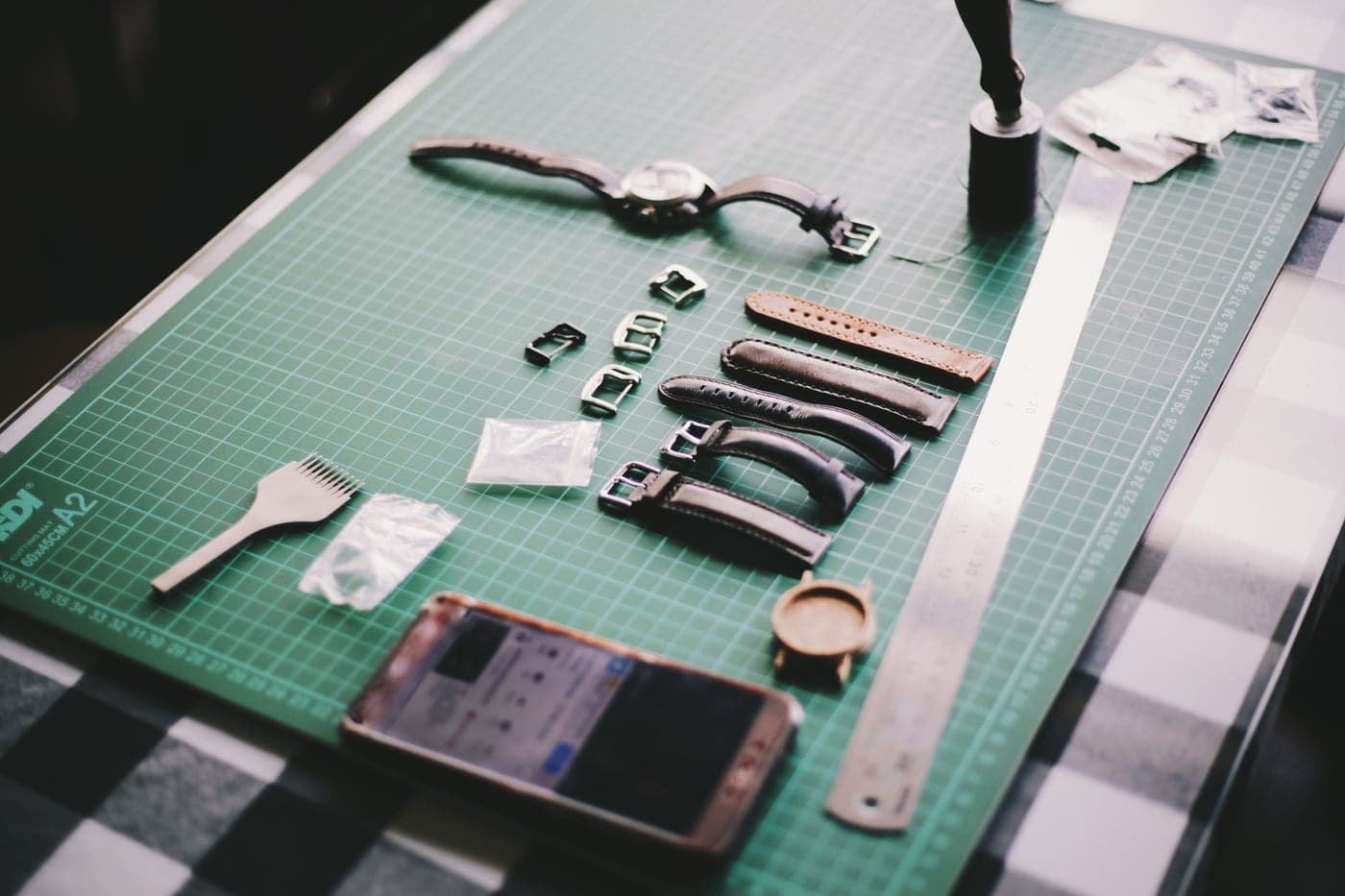 Watch straps laid out on a table